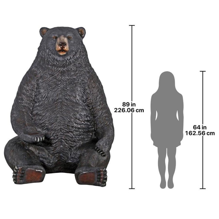 Design Toscano Sitting Pretty Oversized Black Bear Statue with Paw Seat
